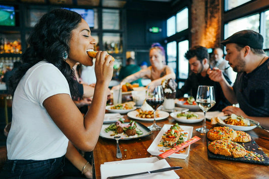 People eating various foods